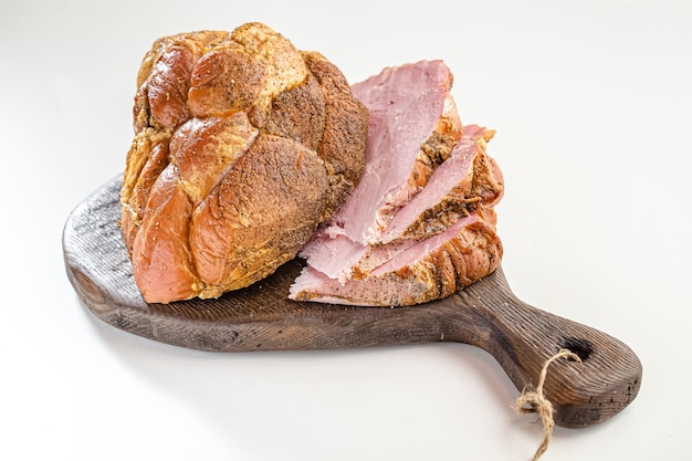 smoked delicacy grilled piece of chicken or pork meat, cut white isolated background