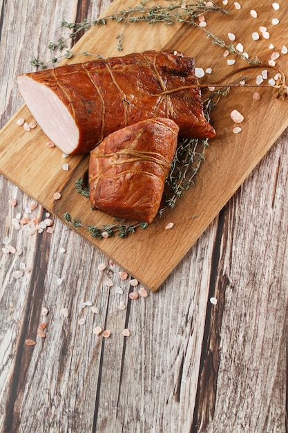 Smoked ham on a chopping board.