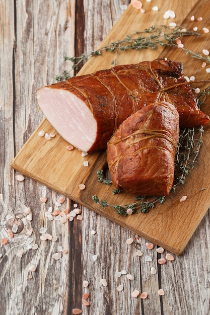 Smoked ham on a chopping board.