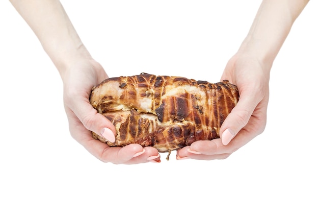 Smoked ham in female's hands Isolated on white