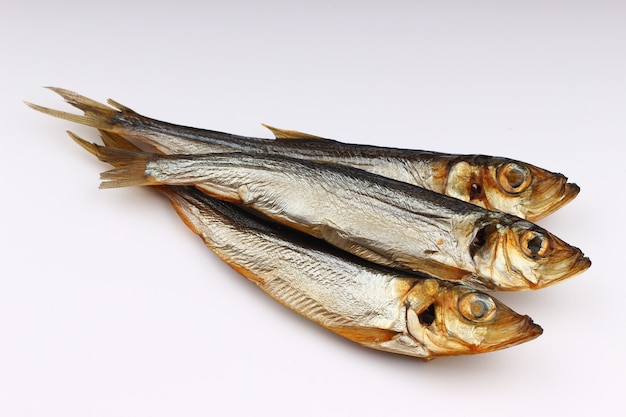 Smoked herring close up on a white background