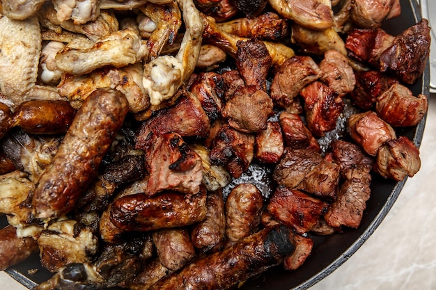 Smoked Meat Snack Beer Set. Top View. Pork kebab, German sausages, chicken wings