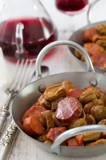 Smoked portuguese sausages chourico with beans