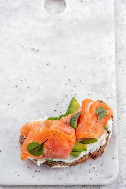 Smoked salmon and avocado on toast breakfast food