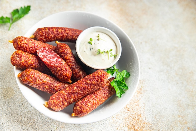 Smoked sausage meat sausages meal snack on the table copy space food background rustic