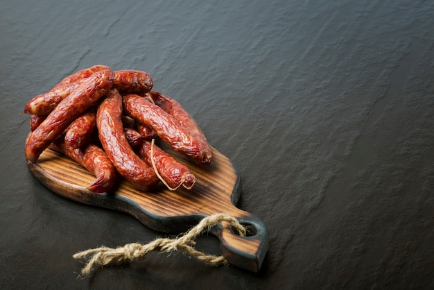 Smoked sausage on table