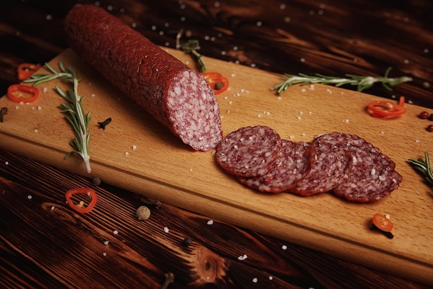 Smoked sausage on a wooden cutting board
