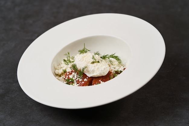 Smoked trout with mashed potatoes and sour cream snow