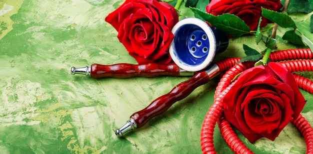 Smoking hookah with rose flavor