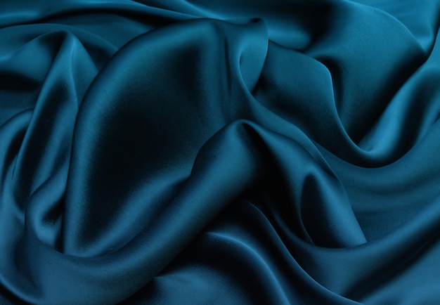 Smooth elegant blue silk satin fabric texture