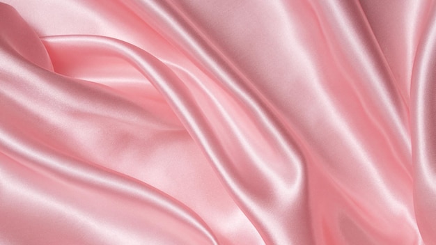 Гладкая элегантная розовая шелковая или атласная роскошная текстура ткани Роскошный дизайн фона