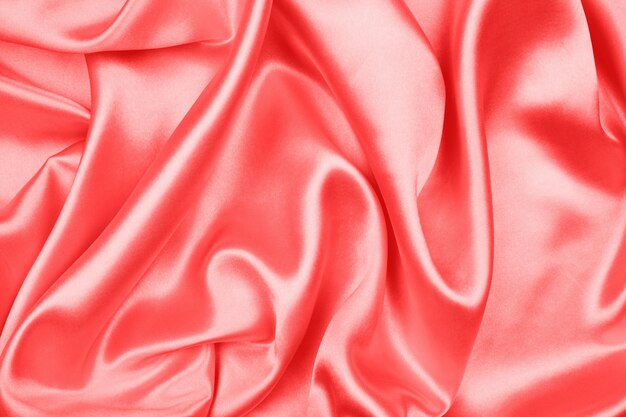 Smooth elegant red silk or satin texture can use as abstract background, fabric