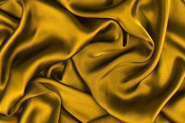 Photo smooth elegant silk or satin luxury cloth texture can use as wedding background. luxurious background design.