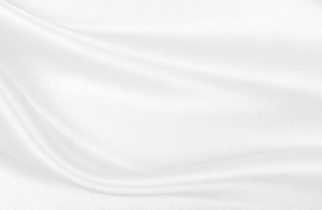 Smooth elegant white silk or satin luxury cloth texture as wedding background