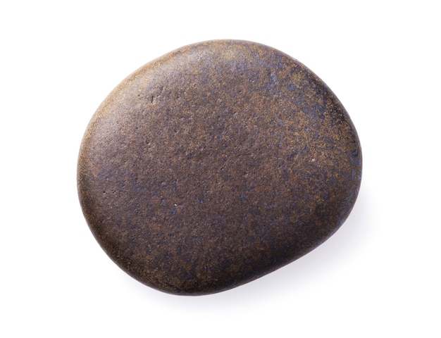 Smooth sea pebbles isolated on a white background top view on a stone of dark color