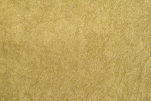 Smooth seamless texture of a terry towel. Olive color