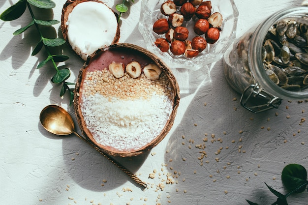 smoothie bowl banana with strawberries and seeds 