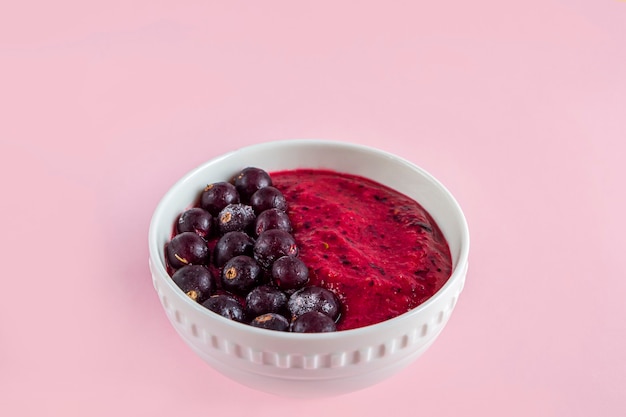 smoothie bowl with blueberries and black currants