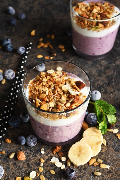 Smoothie with blueberries, yogurt and granola  . Detox menu. Diet.