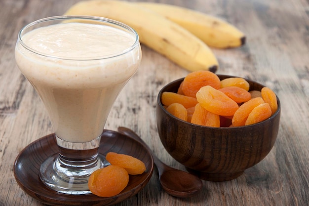 Smoothies of dried apricots and bananas in a glass