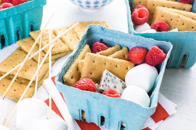 Smores with white chocolate and fresh raspberries.