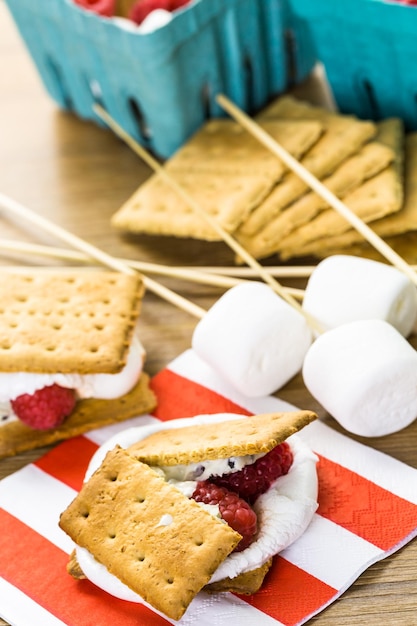 Smores with white chocolate and fresh raspberries.