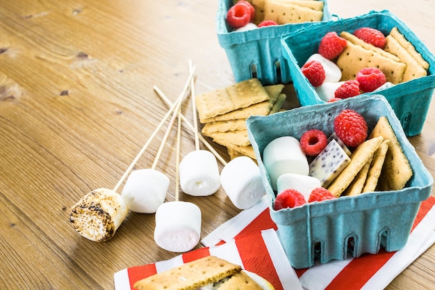 Smores with white chocolate and fresh raspberries.