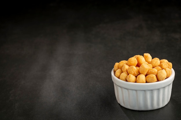 Snacks in ramekin on the table