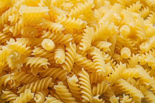 Snelkoppeling spiraal pasta achtergrond eten en drinken concept