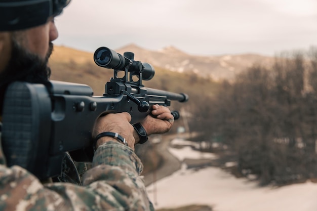 Photo sniper rifle in the hands