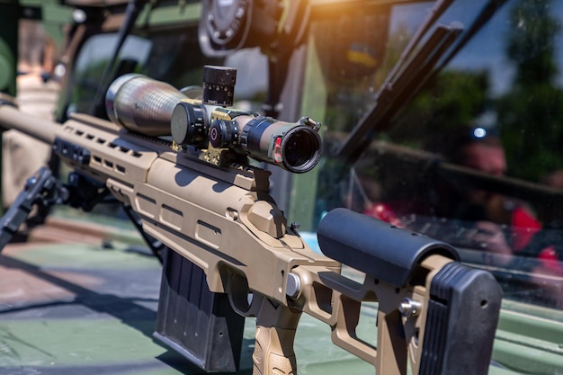 Sniper rifle with a telescopic sight for long range shooting in war