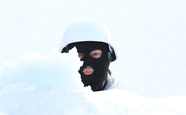 sniper with a gun in winter