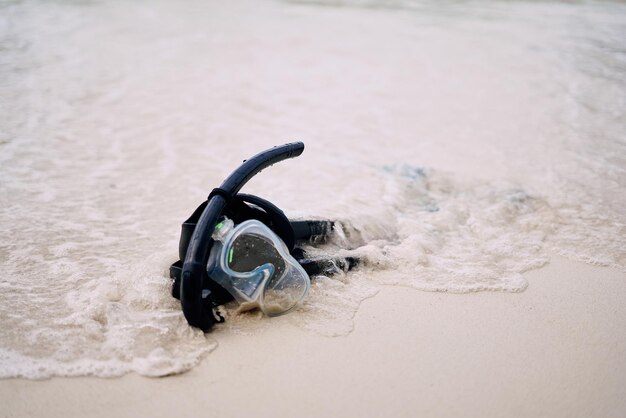 Snorkeling time Still life shot of snorkeling gear on a beach in Raja Ampat Indonesia