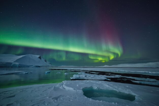 the snow in Antarctica and aurora sky