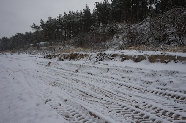 Snow on a beach and dunes winter time