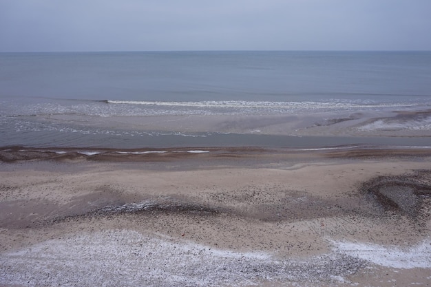 Snow on a beach winter time