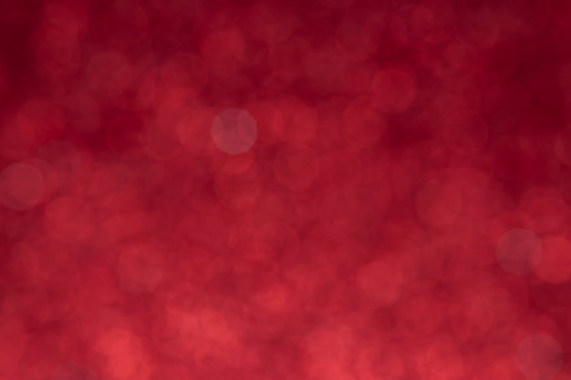 Снег боке Цвет фона красный Абстрактный фон размытых огней с эффектом боке