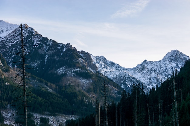 Snow-capped mountain against the blue sky. Nature