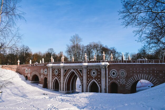 Snow covered bridge against sky