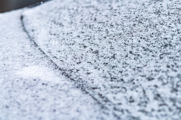 Snow covered car window