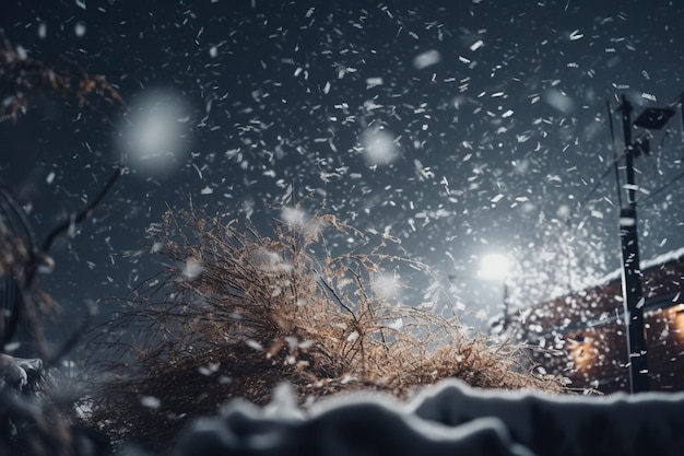 A snow covered ground with a light in the background