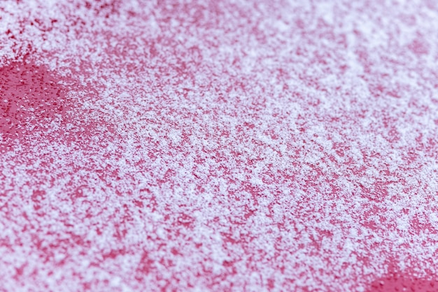 snow covered on the hood of car