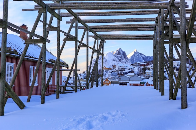 Snow covered land against sky