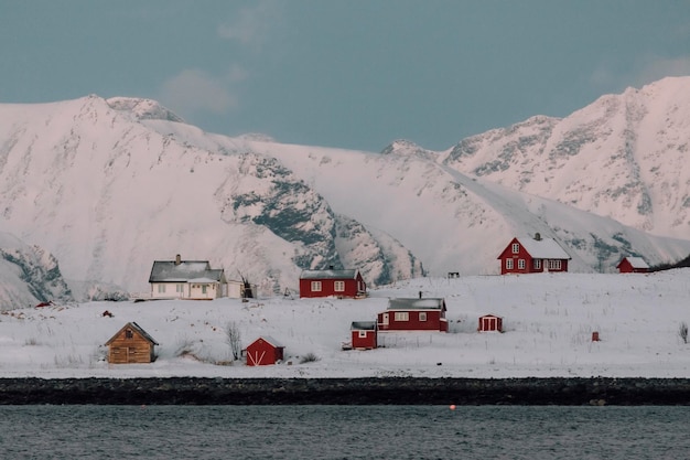 Snow covered landscape against sky