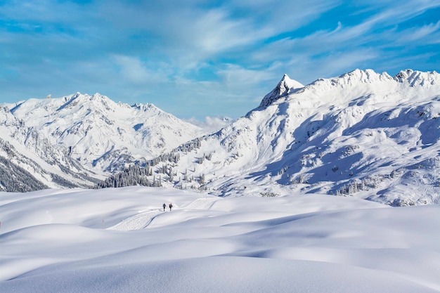 Snow-covered mountain peak winter panorama landscape