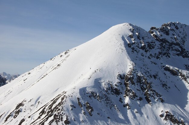 Photo snow covered mountains against sky