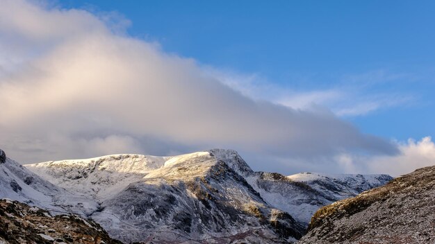 A snow covered portrait of elidir fawr in snowdonia national park north wales