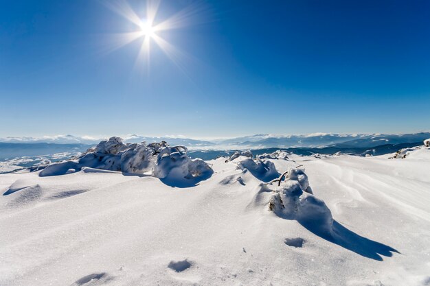 Snow covered winter mountains. 