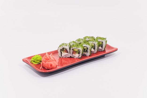 Snow crab, salmon, cream cheese and cucumber rolls isolated on white background.