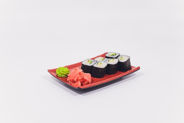 Snow crab, salmon, cream cheese and cucumber rolls isolated on white background.